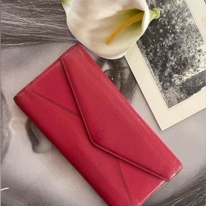 Cartier beautiful leather wallet with the charm zipper pull